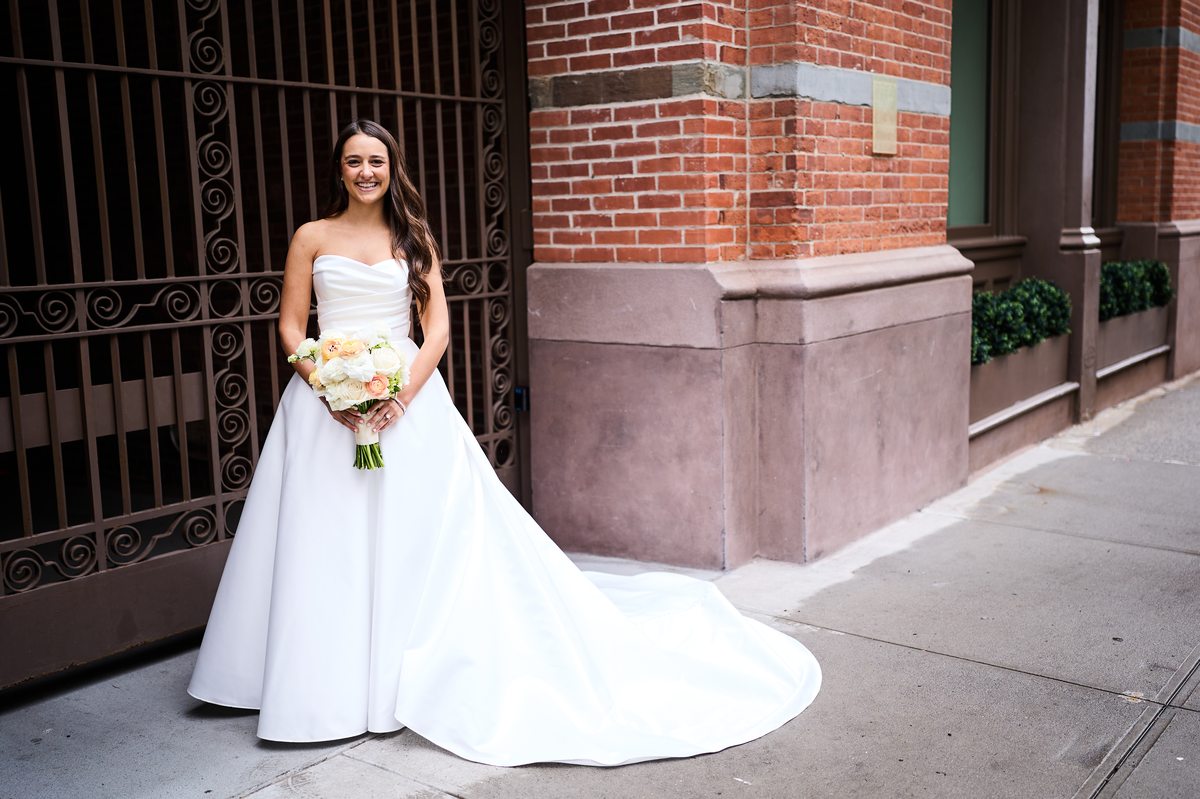 Bride with bouquet on TriBeCa street
