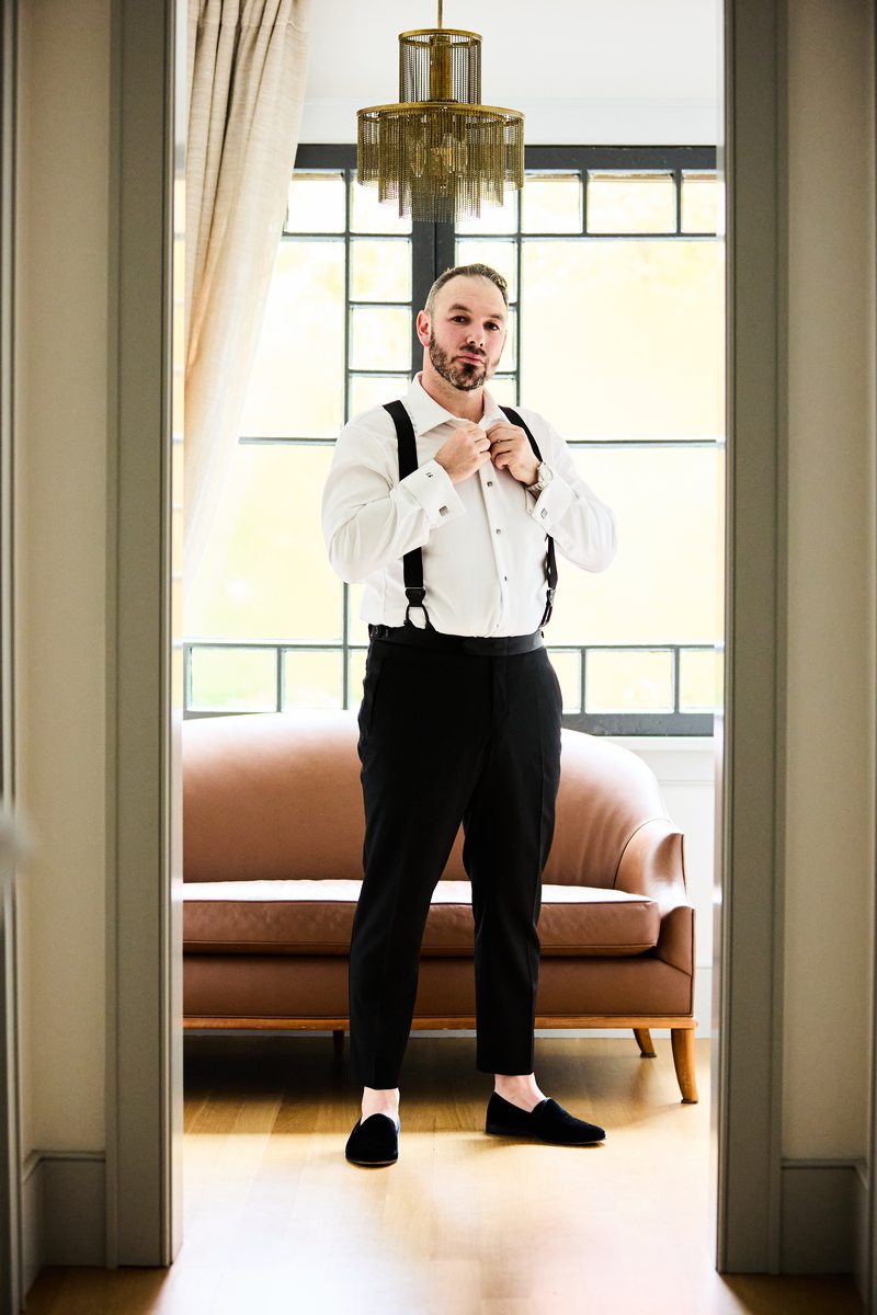 Groom getting ready in a beautiful room